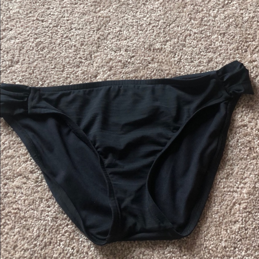 Black bathing suit bottoms.